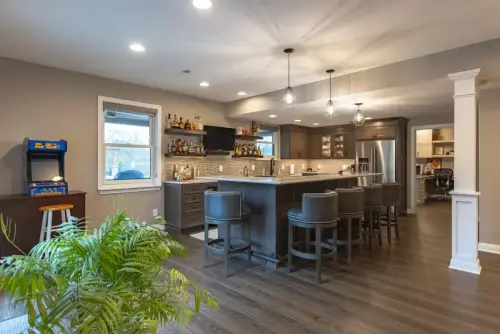 LVP-flooring-in-Cincinnati-area-basement-remodel-with-custom-bar-1
